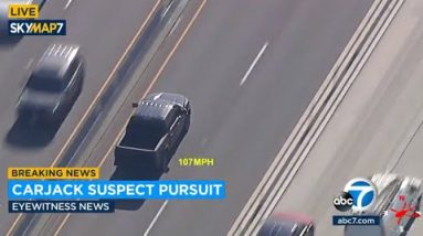 Police chasing carjacking suspect on 91 Parkway shut to Corona home